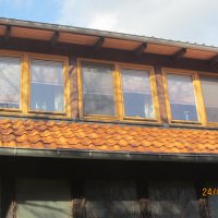 Holzfenster in Dachgaube